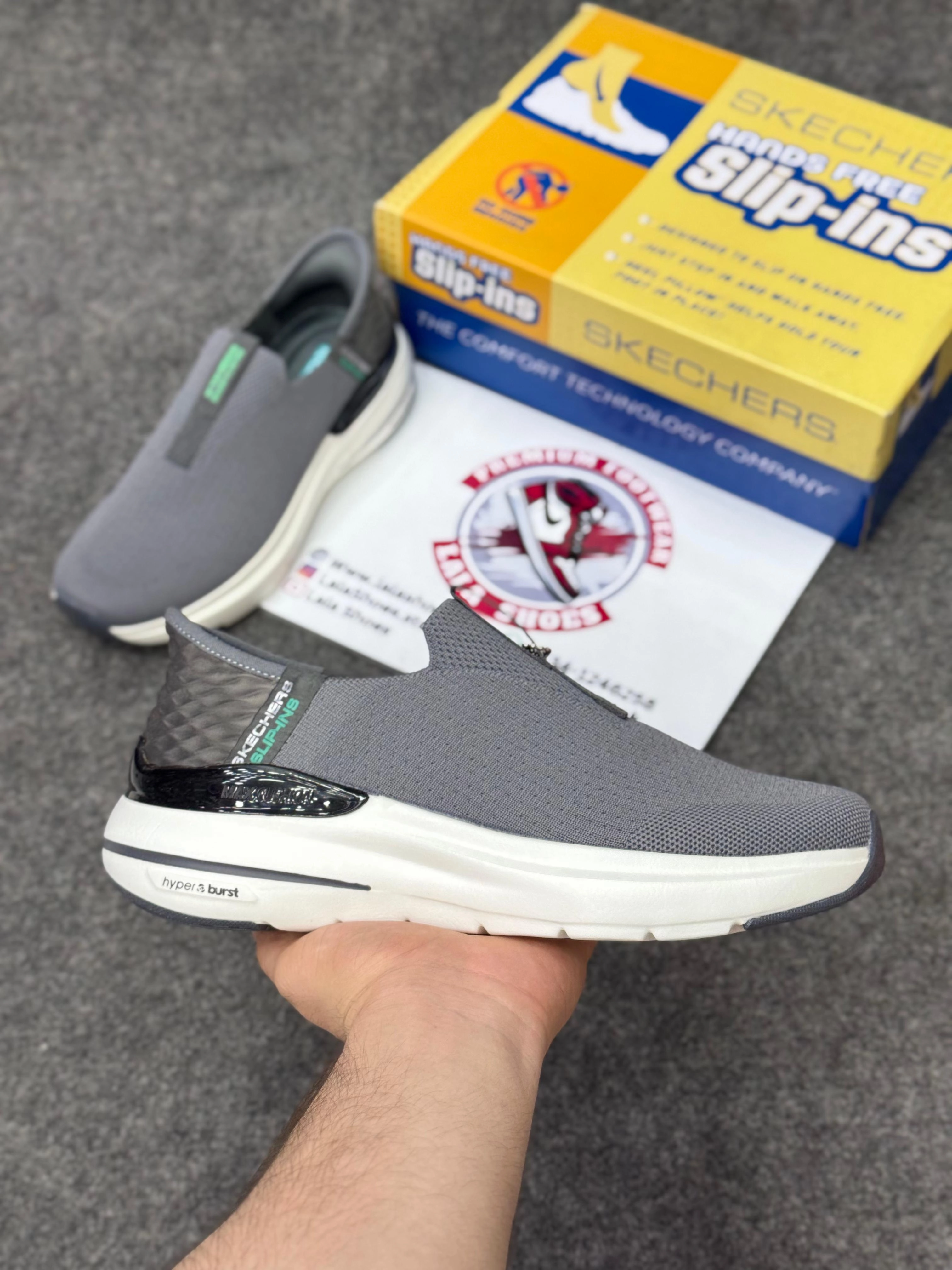 Picture Of A Running Shoe Skechers Slip-ins: Max Cushioning Hyper Burst Grey white, Air-Cooled Memory Foam